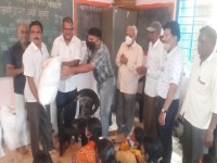 Foodgrain distribution at Tapalwadi, Neral
